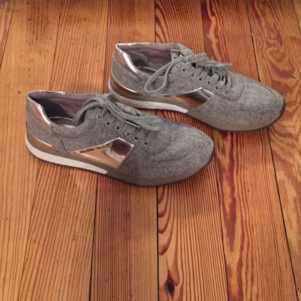 Grey and silver Michael Kors tennis shoes